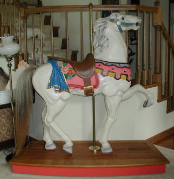 This is 'Spirit' our first life-size carousel horse. Look on the stairs for the Westie Kids, Abby's 2 steps above Nicky! 'Spirit' was hand-carved in 1985 by carousel artist, Robert Curley of Mt. Healthy, Ohio. My husband, Alan, created the lovely base!